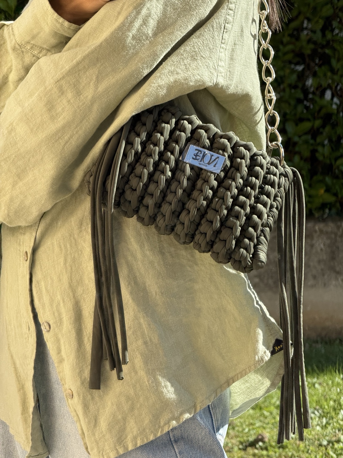 Borsa crochet verde con frange